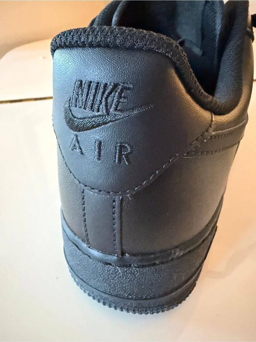 Nike Men's Air Force 1 ‘07 All-Black Low-Top Leather Sneakers